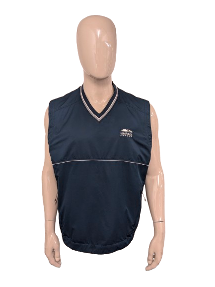 Nike Golf spencer met V-Hals. Donker Blauw gekleurd. Maat XL.