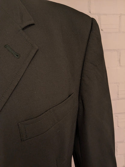 Vintage Tommy Hilfiger Jacke. Dunkelgrün mit schönen Knöpfen. Größe 56 / XL.