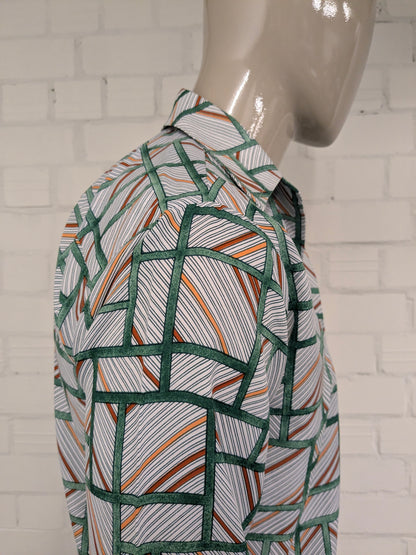 Vintage 70's overhemd met puntkraag. Groen Oranje Bruine print. Maat L.