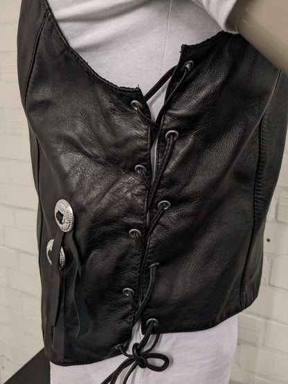Highway1 double-sided leather waistcoat with buckle and leather lace details. Colored black. Size L.