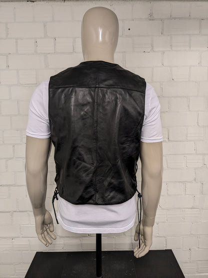 Highway1 double-sided leather waistcoat with buckle and leather lace details. Colored black. Size L.