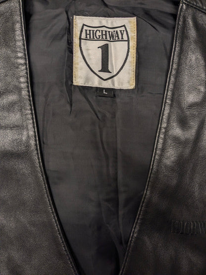Highway1 double-sided leather waistcoat with buckle and leather lace details. Colored black. Size L.