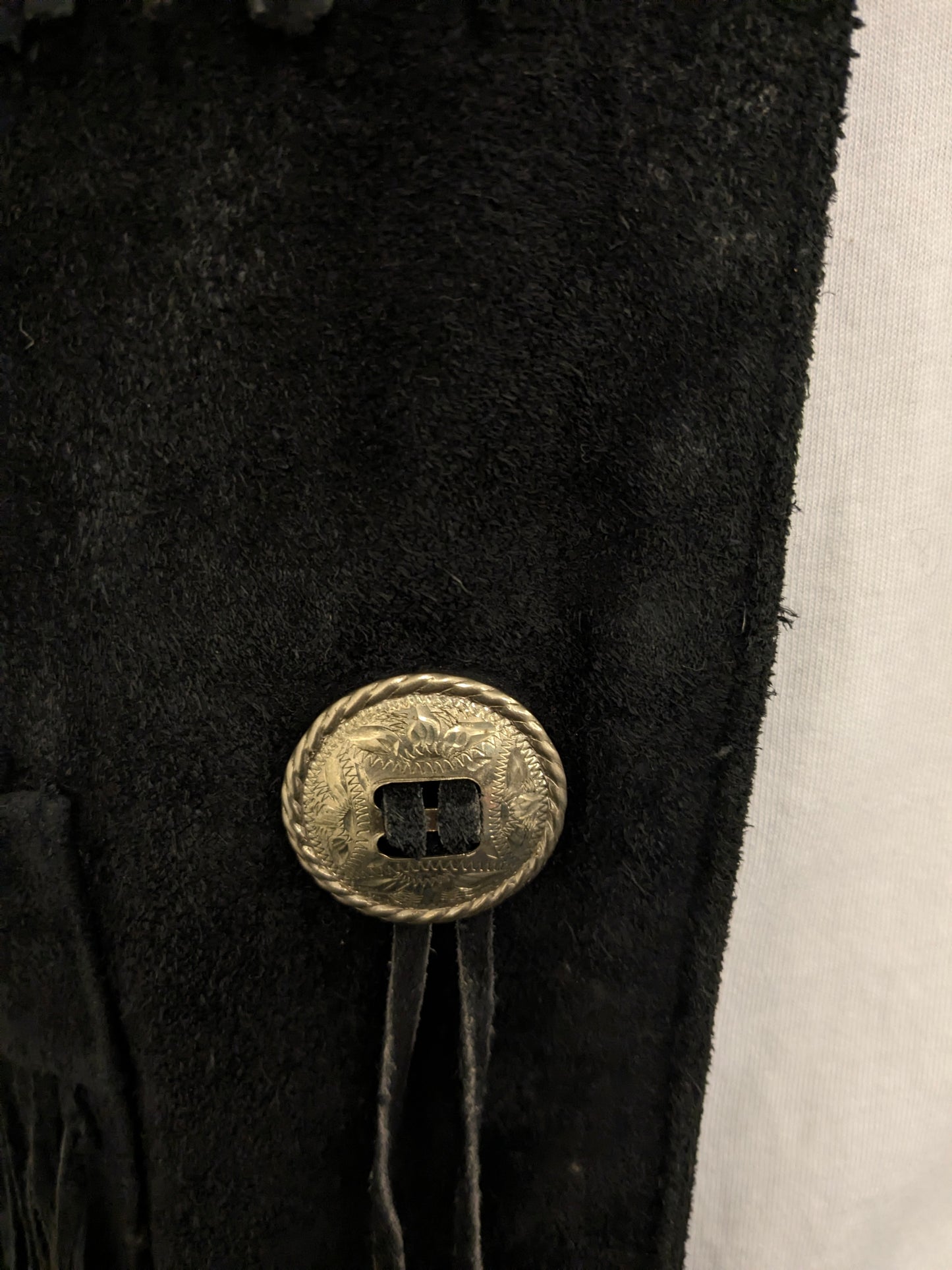 Owings Suede waistcoat with fringes and buckles. Colored black. Size M.
