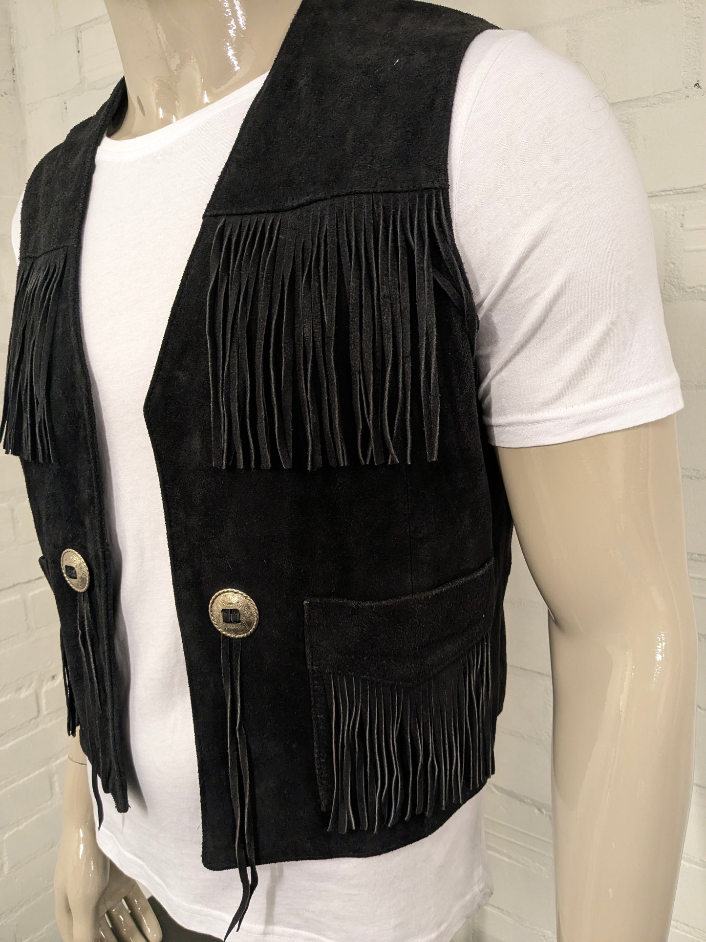 Owings Suede waistcoat with fringes and buckles. Colored black. Size M.