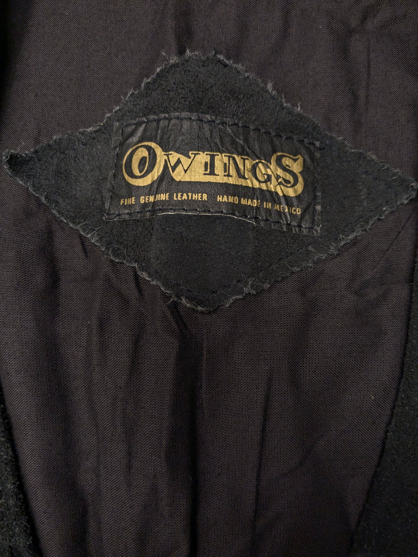 Owings Suede waistcoat with fringes and buckles. Colored black. Size M.