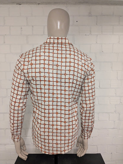 Vintage-Envoy-Hemd aus den 70ern mit spitzem Kragen.  Orange-Braun-Beige-Druck. Größe M.