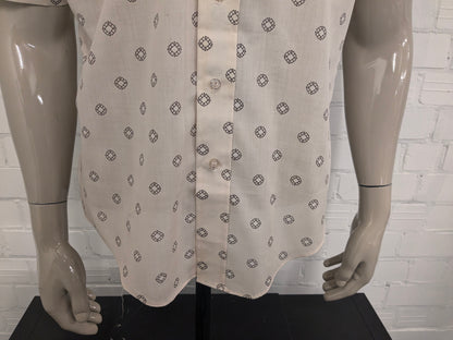 Vintage 70's Permanent Press overhemd met puntkraag en korte mouw. Beige Bruine print. Maat XL.