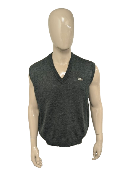 Vintage Lacoste Wollen spencer met V-Hals. Donker Grijs gemêleerd. Maat 2XL / XL. Limited Edition.
