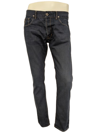 April 77 jeans. Blauw gekleurd met bruine stiksels. Maat W34 - L34.