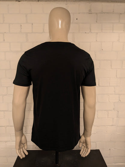 Pink Floyd "the dark side of the moon" shirt. Zwart met opdruk. Maat M.