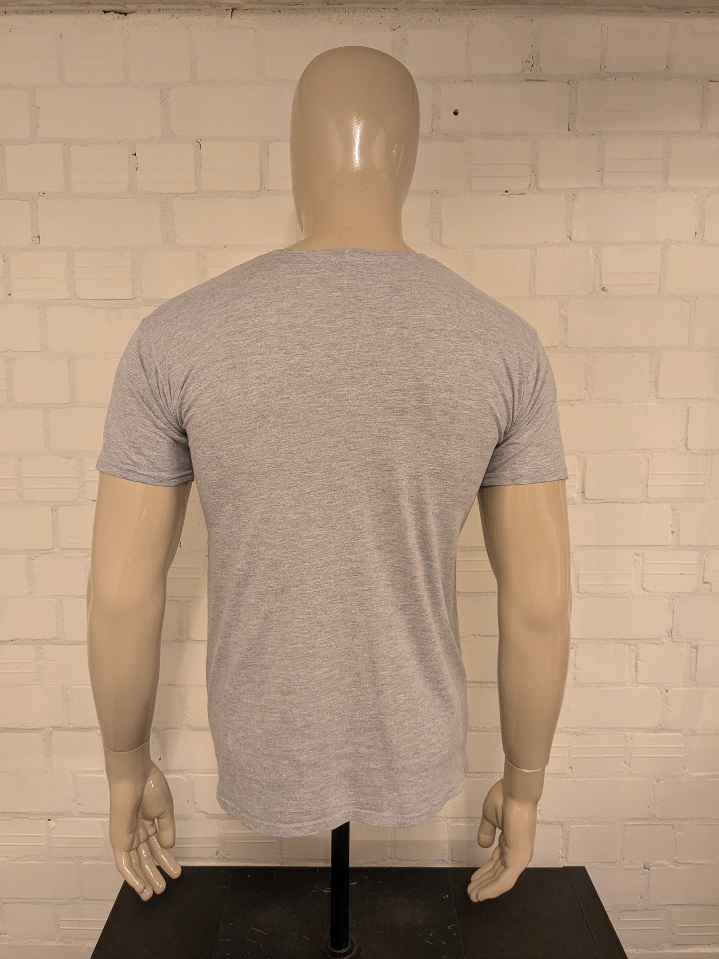 Super Mario shirt. Grijs met opdruk. Maat M.
