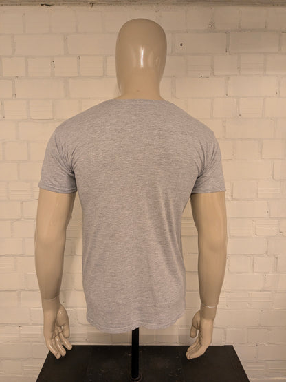 Super Mario shirt. Grijs met opdruk. Maat M.