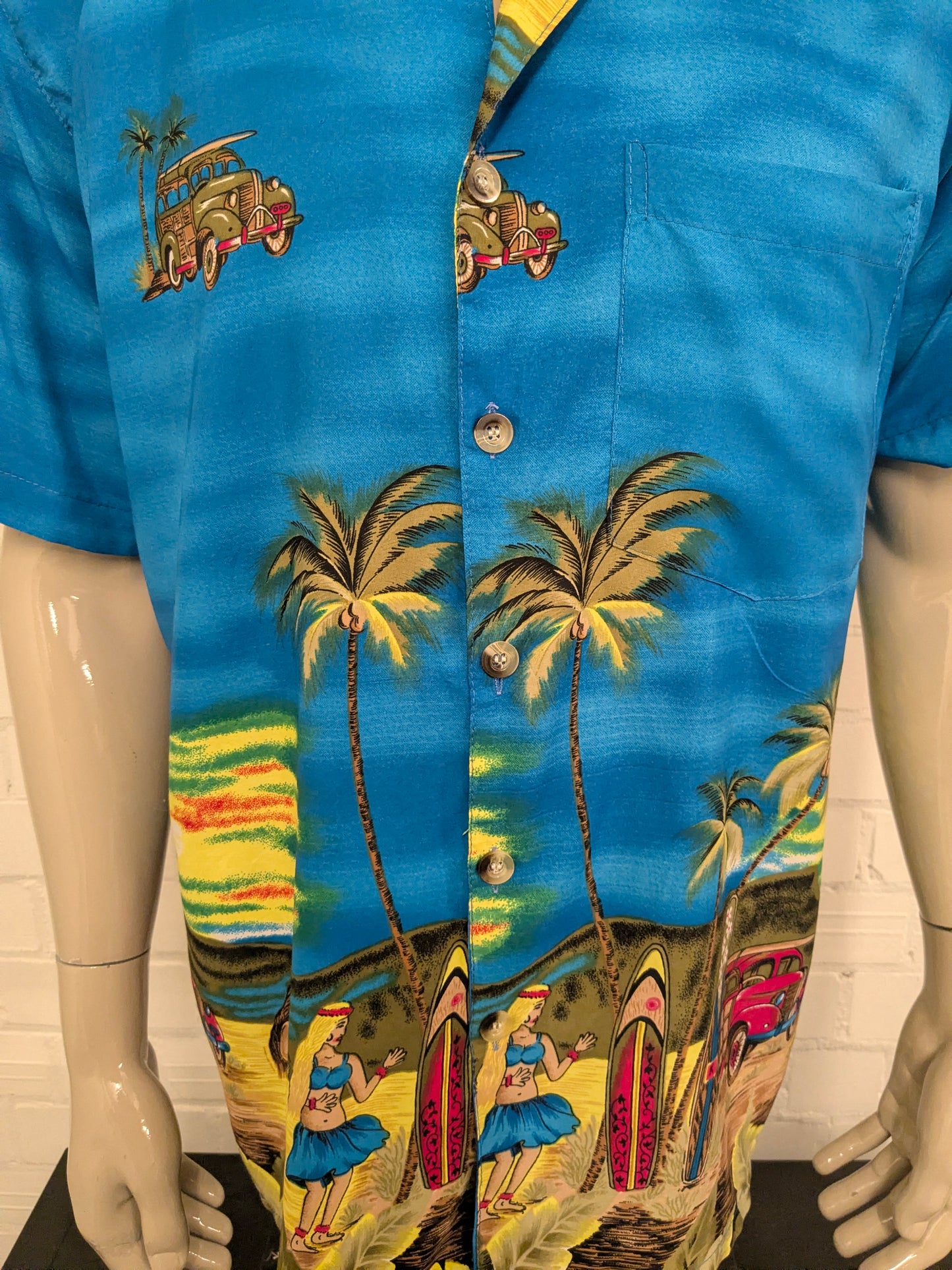 YMLA Resort Wear Hawaii overhemd korte mouw. Blauw met gekleurde print. Maat L.