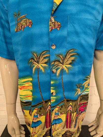 YMLA Resort Wear Hawaii overhemd korte mouw. Blauw met gekleurde print. Maat L.