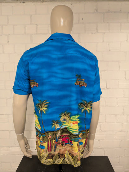 YMLA Resort Wear Hawaii overhemd korte mouw. Blauw met gekleurde print. Maat L.