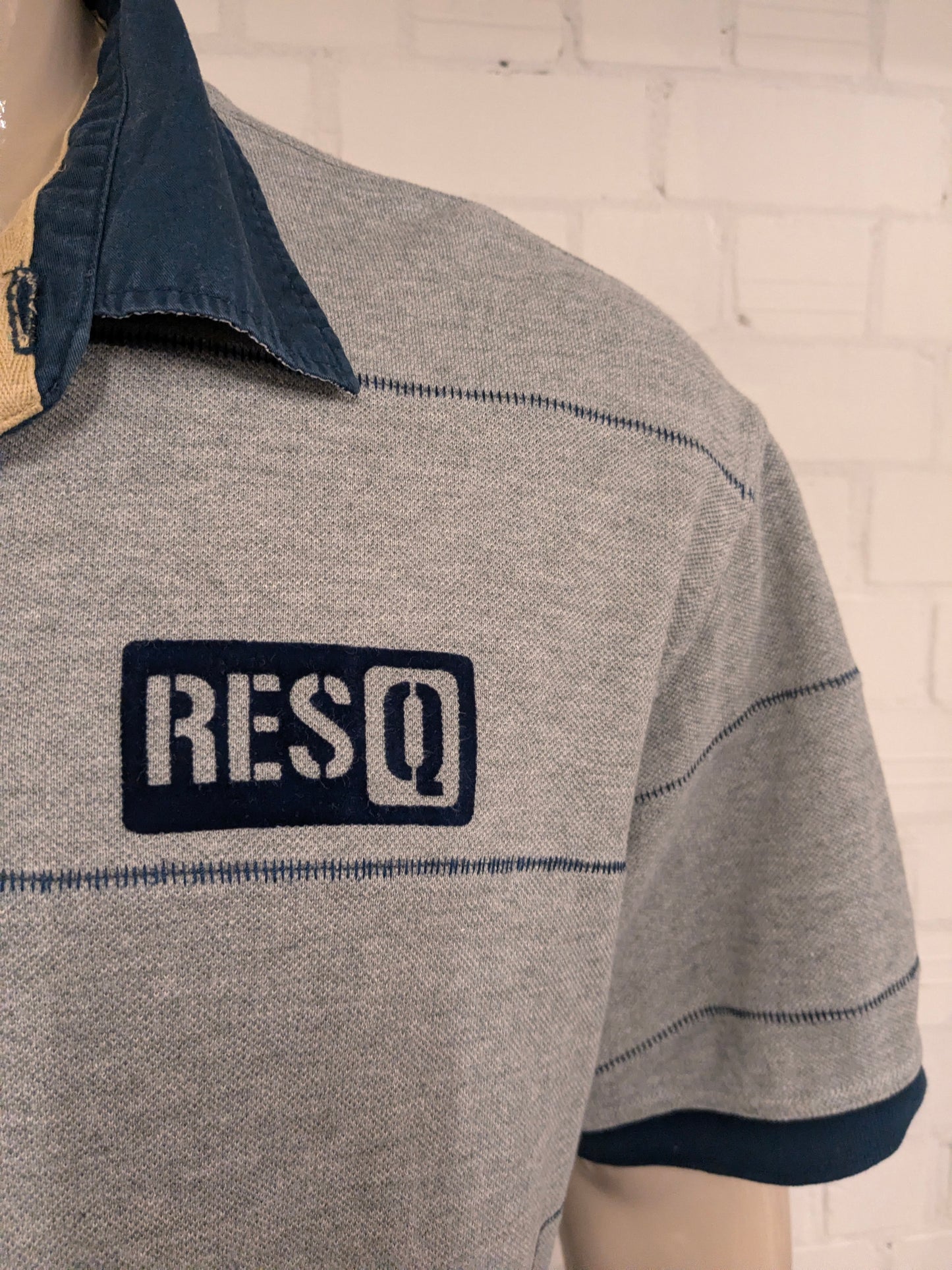 ResQ polo. Grijs Blauw gestreept. Maat 2XL / XXL.
