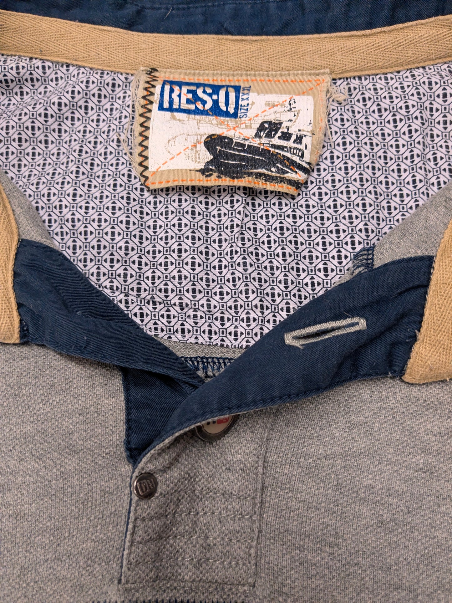 ResQ polo. Grijs Blauw gestreept. Maat 2XL / XXL.