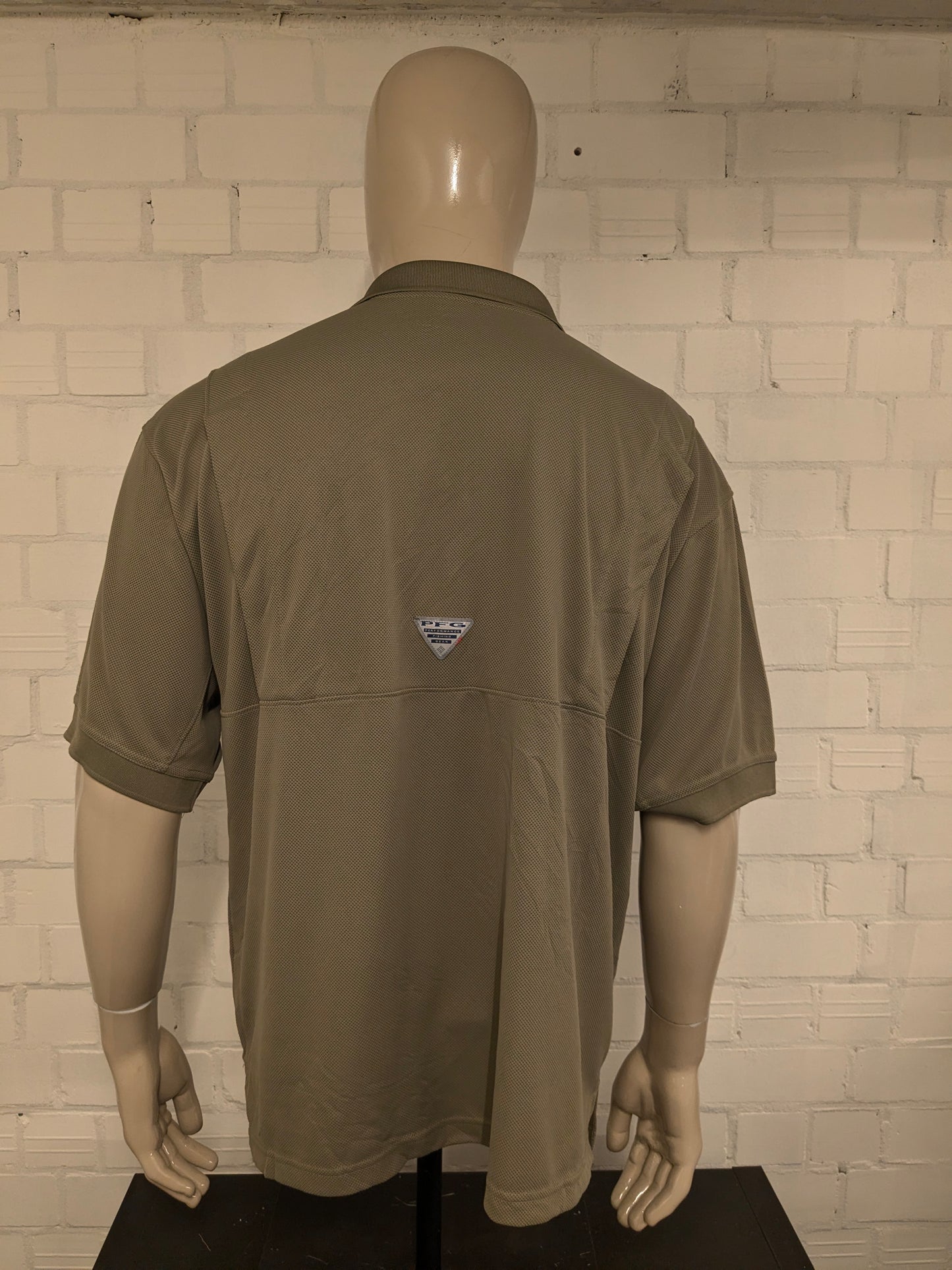 Columbia PFG polo. Groen motief. Maat XL.