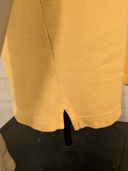 Nautica polo. Geel gekleurd. Maat L.