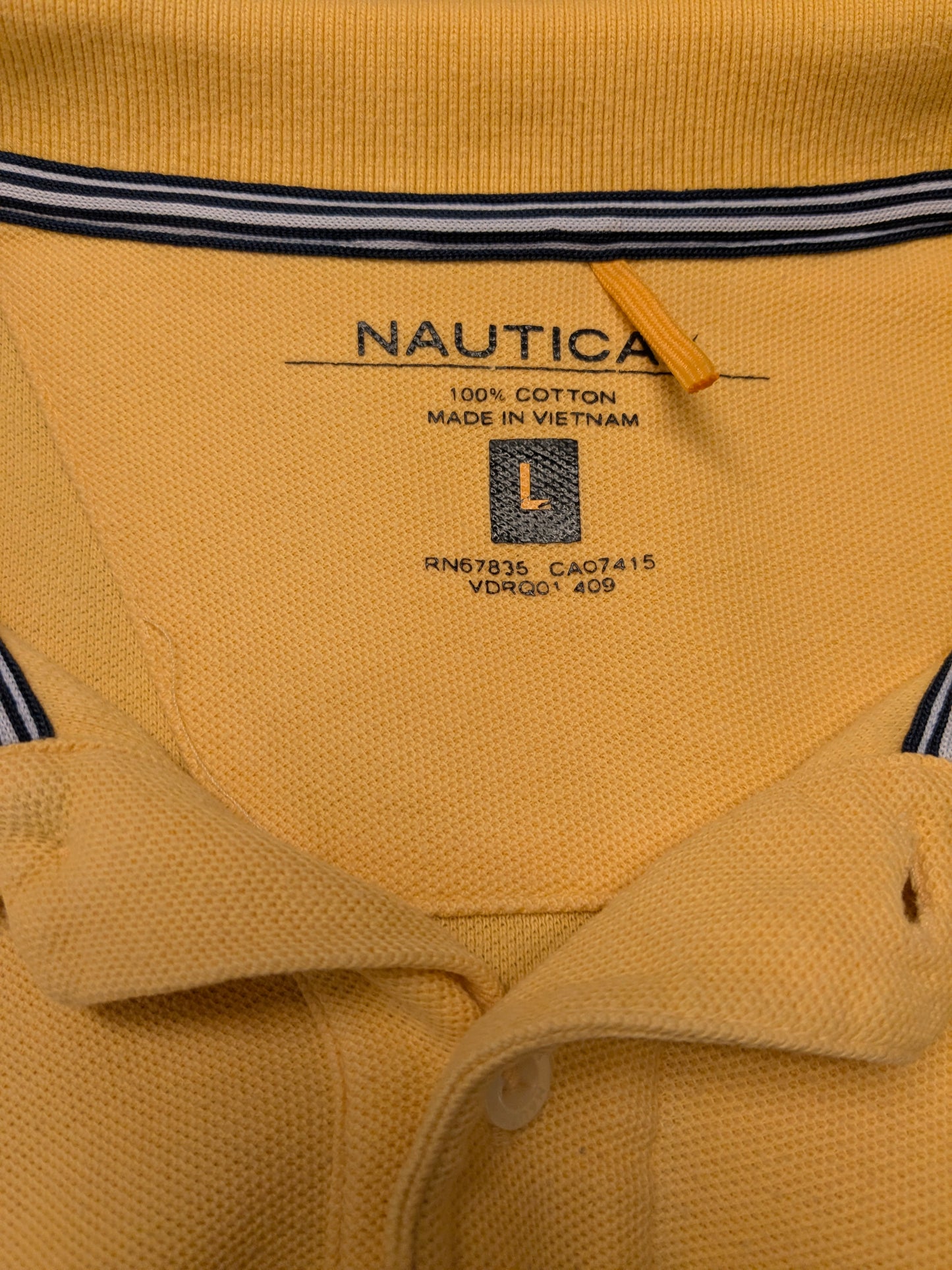 Nautica polo. Geel gekleurd. Maat L.