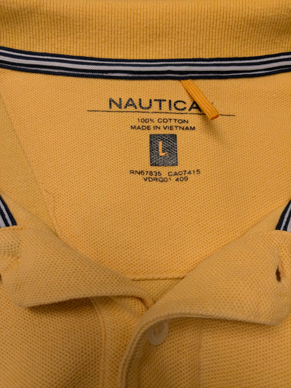 Nautica polo. Geel gekleurd. Maat L.