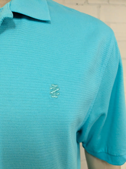 Izod polo. Blauw gestreept motief. Lang model! Maat XL.