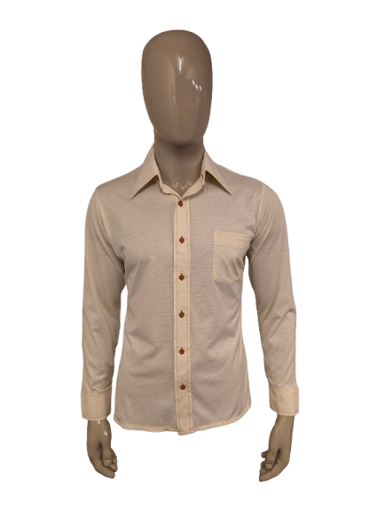 Vintage 70's Glo-Wave overhemd met puntkraag. Licht geel gemêleerd met doorzichtig paisley motief. Maat L.