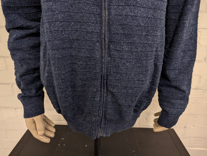 Nautica vest met rits. Blauw gemêleerd met voelbaar gestreept motief. Maat XL.