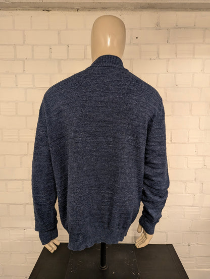 Nautica vest met rits. Blauw gemêleerd met voelbaar gestreept motief. Maat XL.