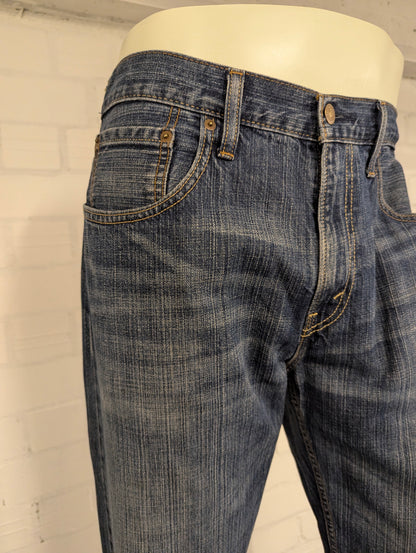 Levi's 569 jeans. Blauw gemêleerd. Loose straight. Maat W34 - L34.