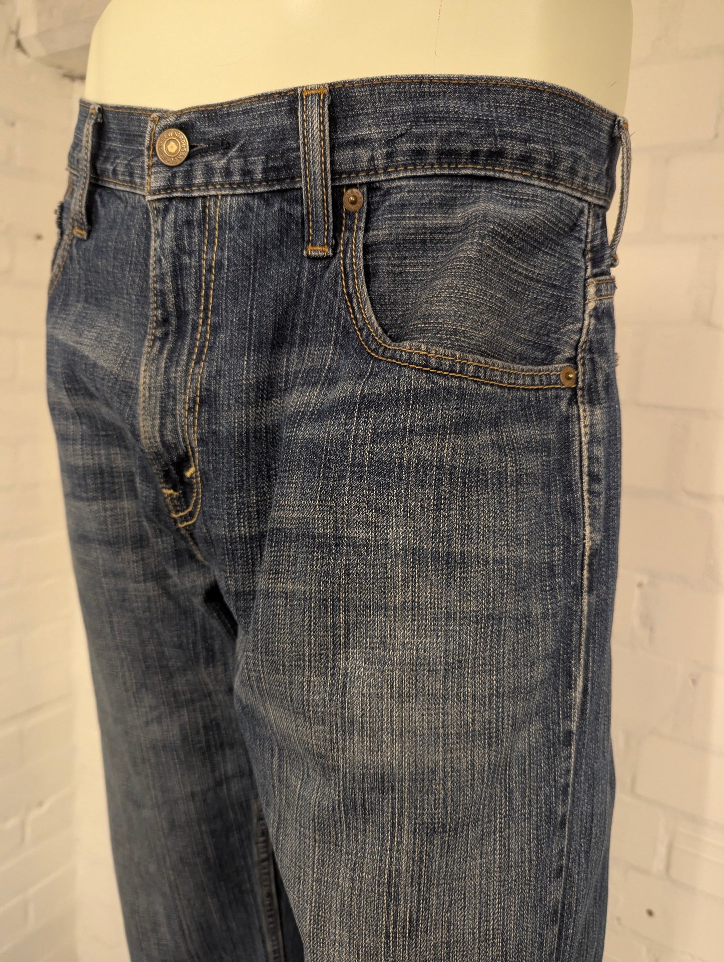 Levi's 569 jeans. Blauw gemêleerd. Loose straight. Maat W34 - L34.