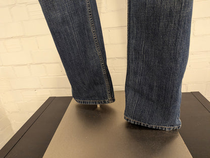 Levi's 569 jeans. Blauw gemêleerd. Loose straight. Maat W34 - L34.