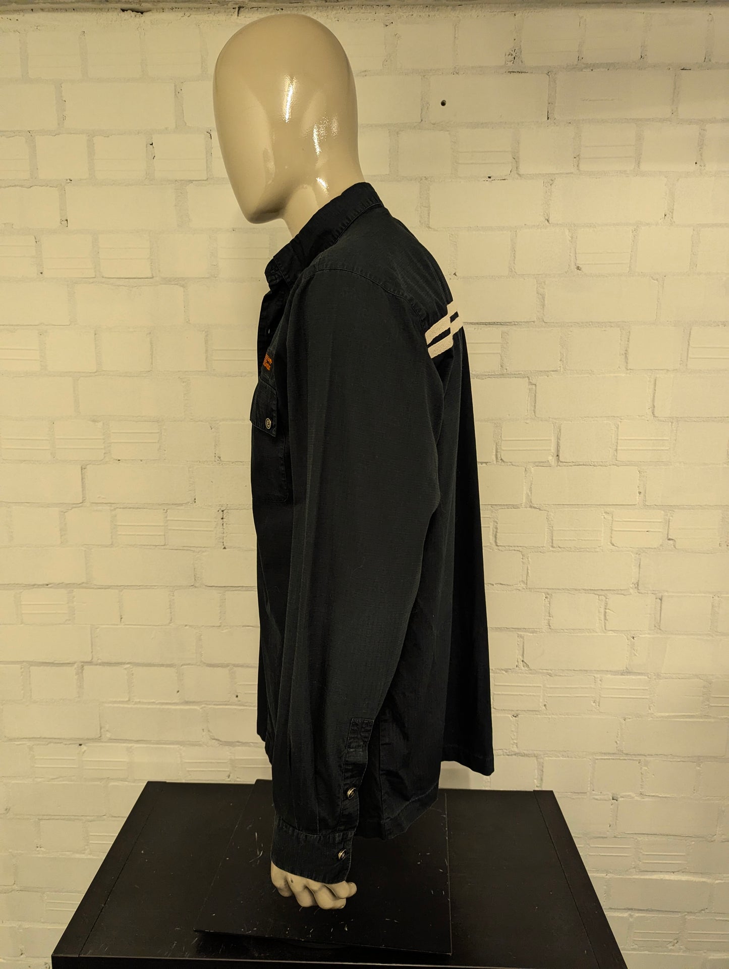 Original Harley Davidson overhemd. Zwarte met mooie emblemen. Maat XL.