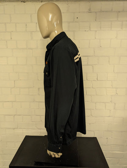 Original Harley Davidson overhemd. Zwarte met mooie emblemen. Maat XL.