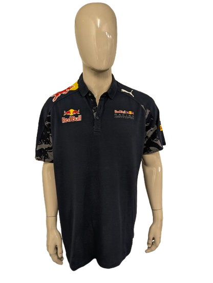 Red Bull Racing Puma polo. Donker Blauw Grijs gekleurd met opdruk. Maat 2XL / XXL.