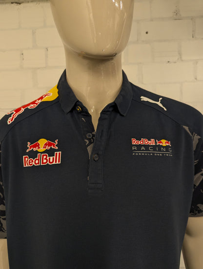 Red Bull Racing Puma polo. Donker Blauw Grijs gekleurd met opdruk. Maat 2XL / XXL.