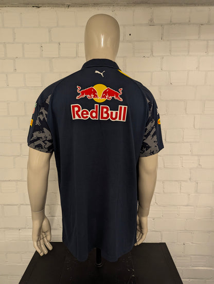 Red Bull Racing Puma polo. Donker Blauw Grijs gekleurd met opdruk. Maat 2XL / XXL.