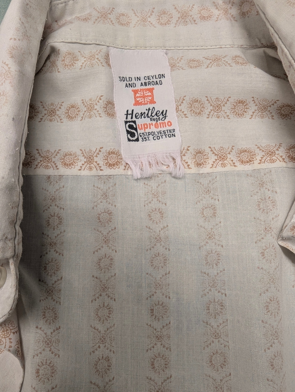 Vintage 70's Hentley overhemd met puntkraag. Beige Bruine print. Maat XL.