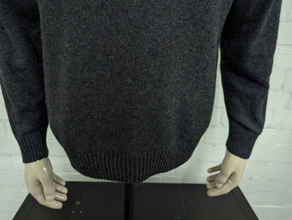 Italian Collection Wollen trui met V-Hals. Donker Grijs gemêleerd. 80% Wol en 20% Polyamide. Maat L.