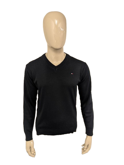 Tommy Hilfiger Wollen trui met V-Hals. Donker Blauw gekleurd. Maat M. 100% Wol.