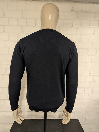 Tommy Hilfiger Wollen trui met V-Hals. Donker Blauw gekleurd. Maat M. 100% Wol.