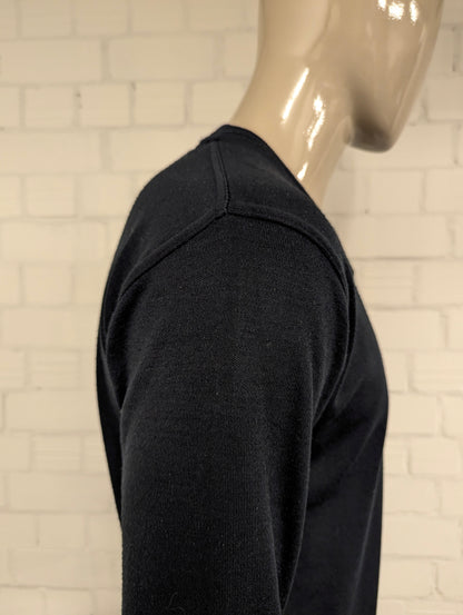 Tommy Hilfiger Wollen trui met V-Hals. Donker Blauw gekleurd. Maat M. 100% Wol.
