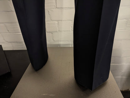 Corneliani Merino Wollen Kostuum. Donker Blauw gekleurd. Gecombineerde maat. Super 150's. #830. Pantalon maat 52. Colbert maat 54.