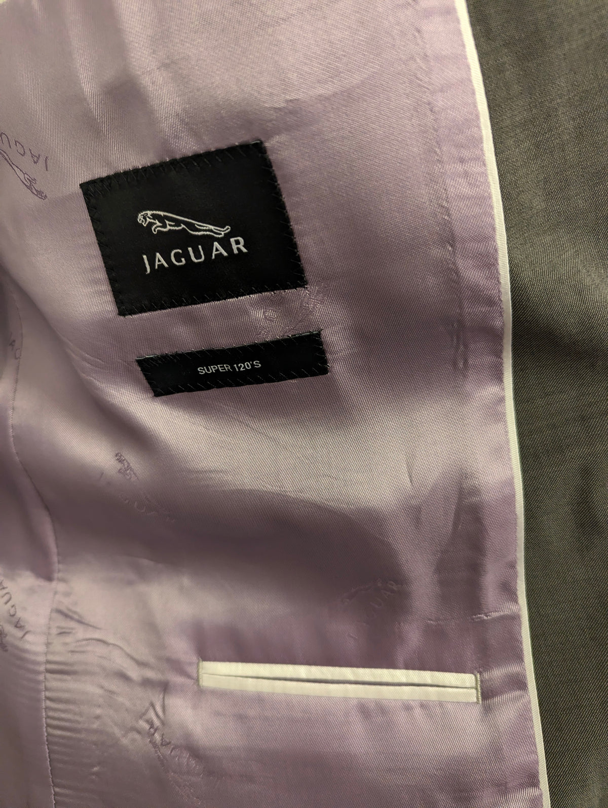 Jaguar Wollen Kostuum. Grijs gemêleerd. Maat 26 (52/L).