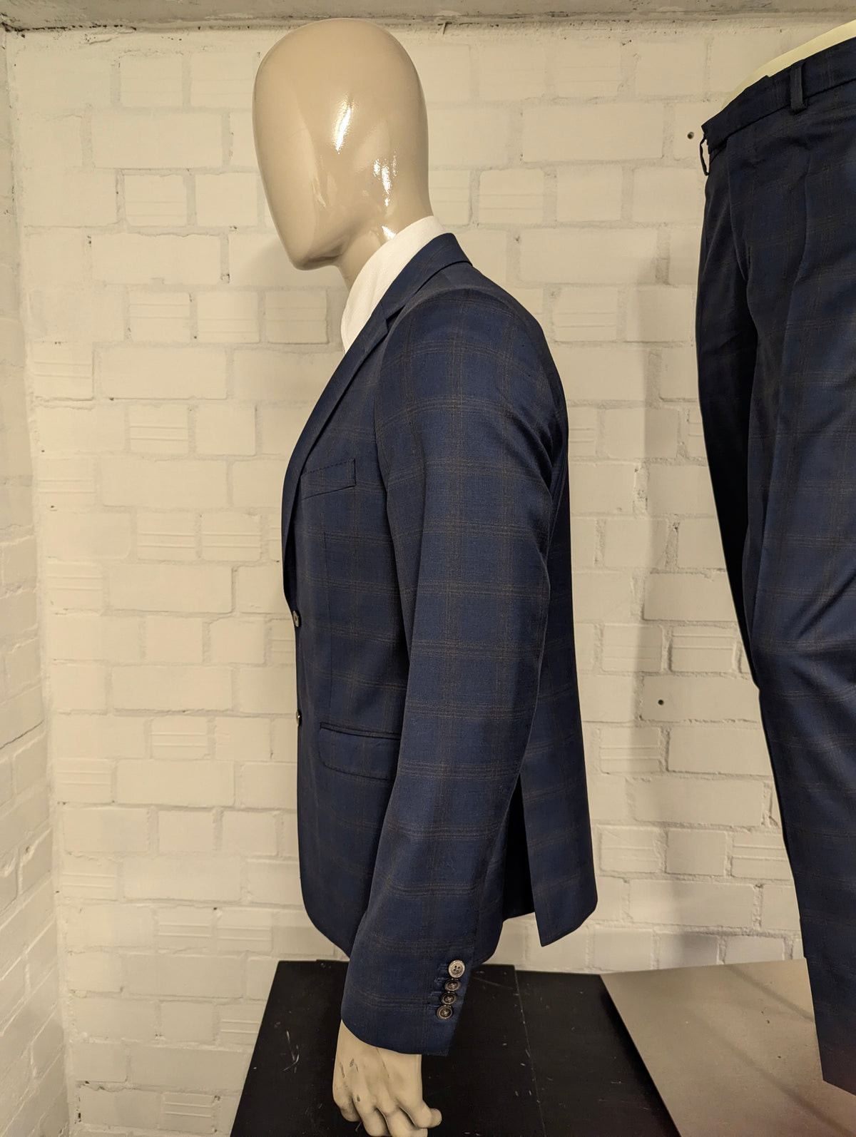 Gentiluomo Wollen Kostuum. Blauw Grijs gemêleerd. Maat 52/L.  slim fit. type verona.
