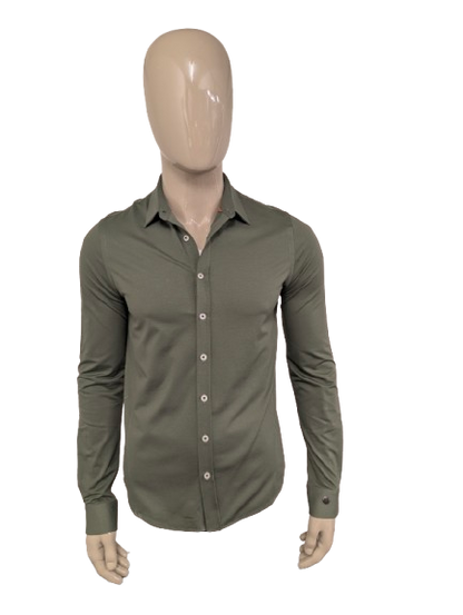 Camicia in ghisa. Colorato di verde. Taglia M.
