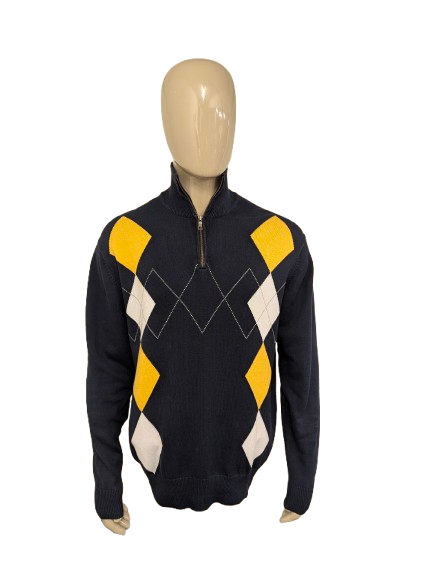 Pull Nautica Quarter Zip avec fermeture éclair courte. Diamant Argyle bleu foncé jaune blanc gris. Taille XL.