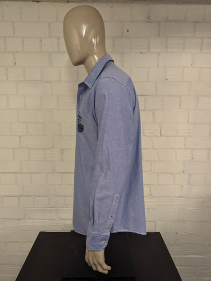 MAN by Tchibo overhemd. Blauw gemêleerd met applicaties. Maat XL.