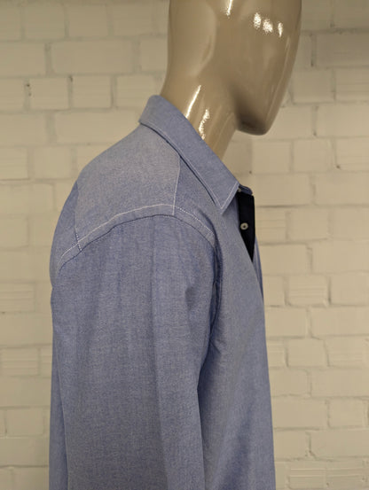 MAN by Tchibo overhemd. Blauw gemêleerd met applicaties. Maat XL.