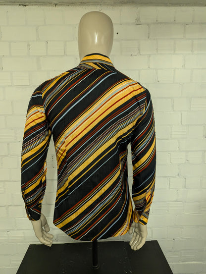 Vintage 70's overhemd met puntkraag. Geel Rood Zwart Grijs gestreept. Maat M. #729.